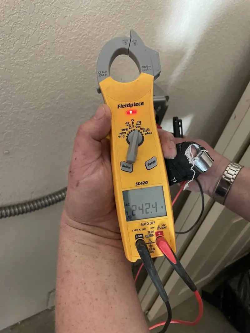 Voltage testing with clamp meter during Ceiling Fan Installation in Canaan